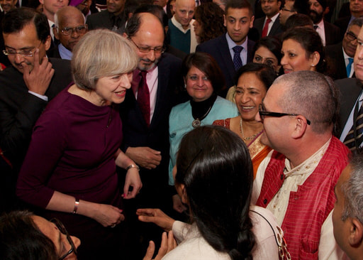 IMG Mahaprabhu dasa meets British Prime Minister during reception at 10 Downing Street for Diwali.