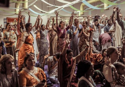 Devotees dancing at a festival